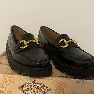 G.H. Bass & Co. Black Loafers with Gold Accents